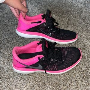 Black and pink Nike training sneakers